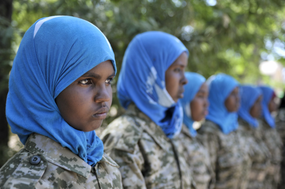 Female Somali National Army (SNA) soldiers stand at attention at a camp in Belet Weyne, where the SNA are given training by the Djiboutian contingent of the African Union Mission in Somalia (AMISOM).